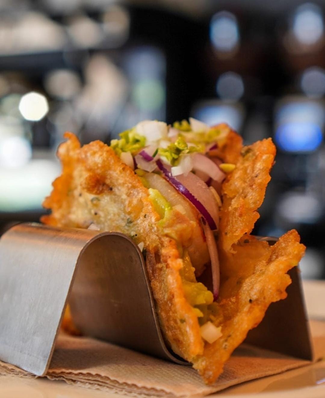 Crispy shrimp tortillas with guacamole and BBQ king prawn